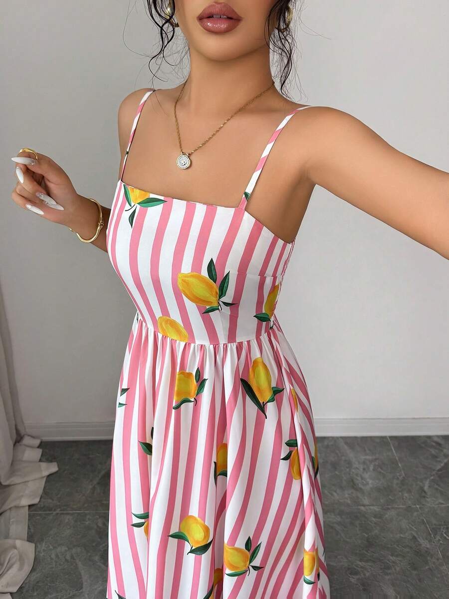 Side view of women's fruit print maxi dress with slim fit