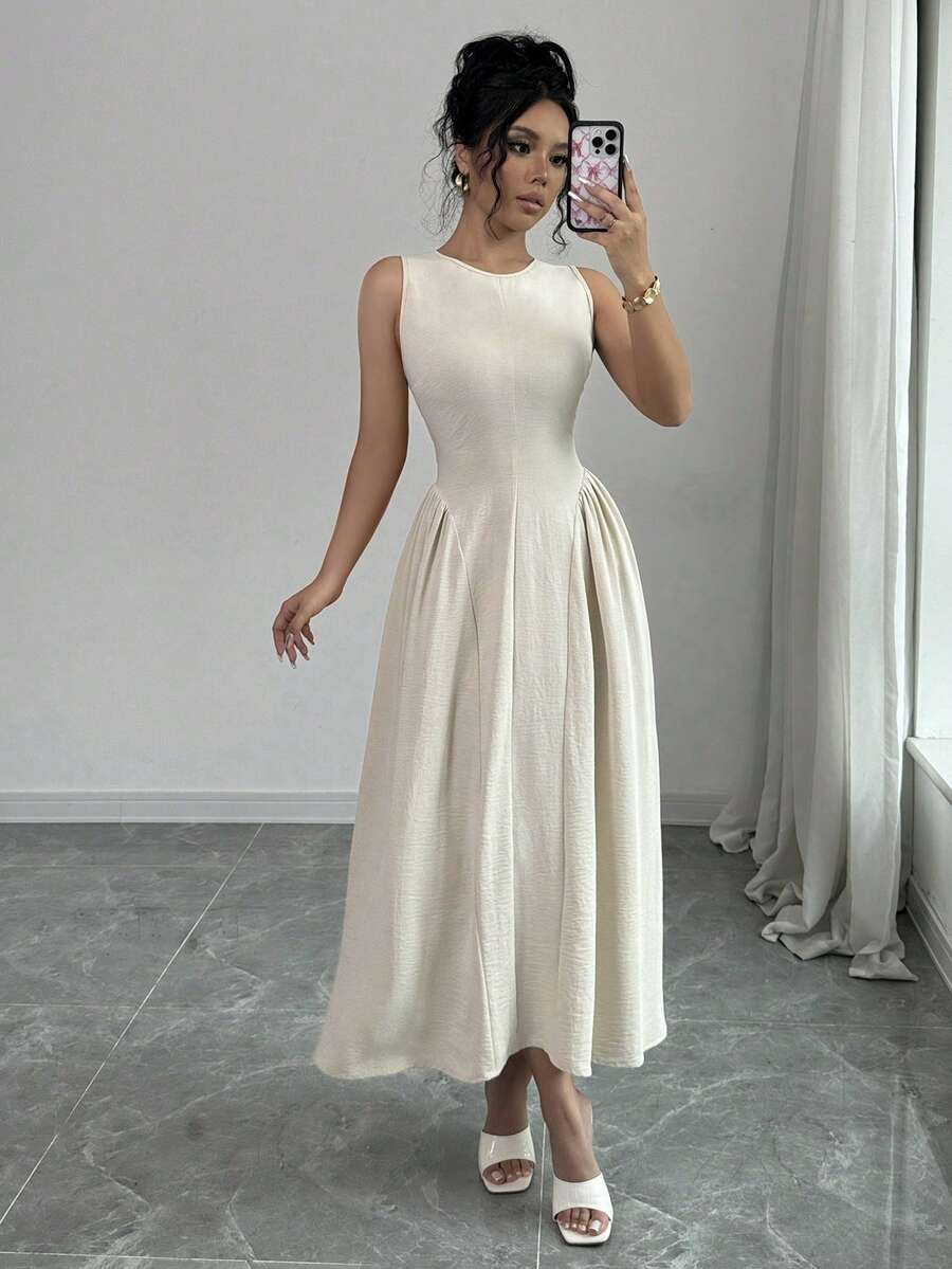 Front view of apricot sleeveless midi dress with fitted bodice and full skirt