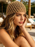 Tan open knit crochet beanie cap with breathable mesh texture