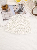 White openwork crochet mesh beanie with small sequin details