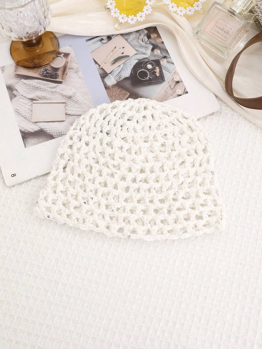 White openwork crochet mesh beanie with small sequin details