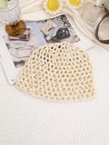 Close view of hollow out crochet cap with tiny shiny accents