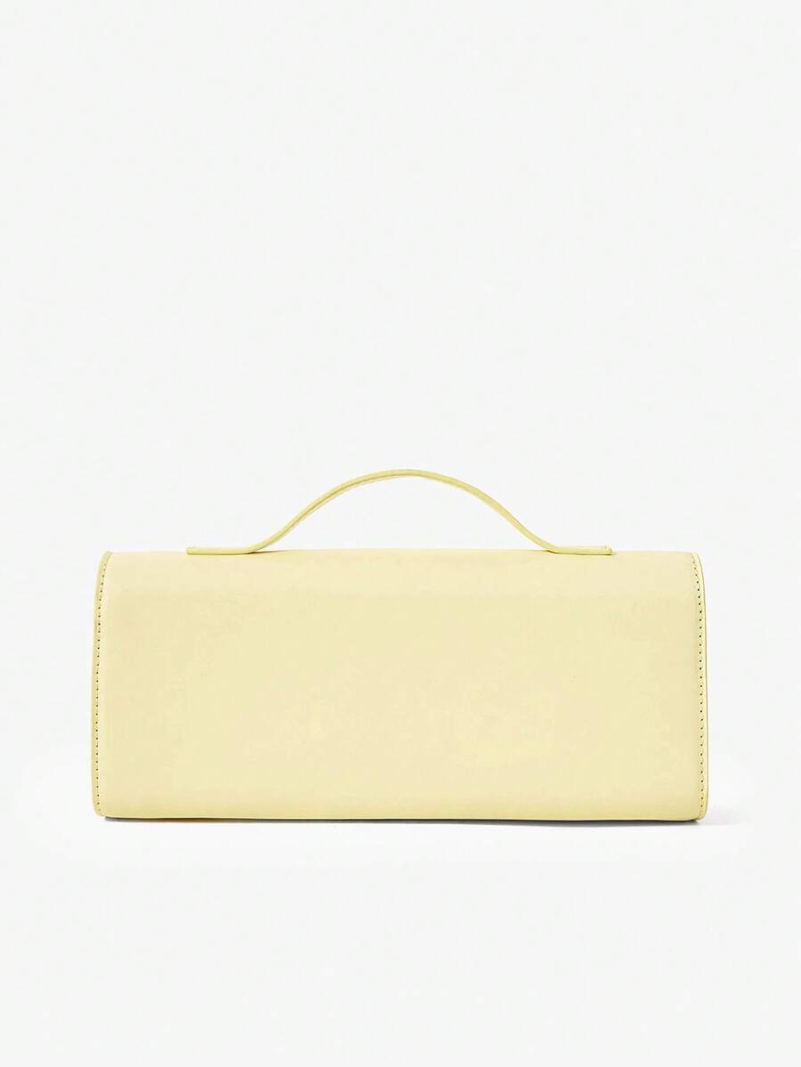 Light yellow mini bag showing rounded side gusset and arched top handle