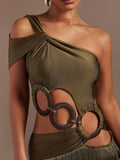 Back view of multicolor floral suspender jumpsuit with rear patch pockets