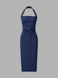 Back view navy halter midi dress