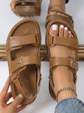 Overhead view of tan adjustable platform sandals with broad straps and heel support