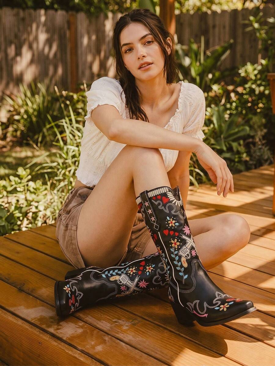 Heel view of Vintage Embroidered Women’s Western Boots - Retro Cowgirl Block Heel Mid-Calf Shoes for Stylish Weddings and Riding for punk motorcycle boot styling