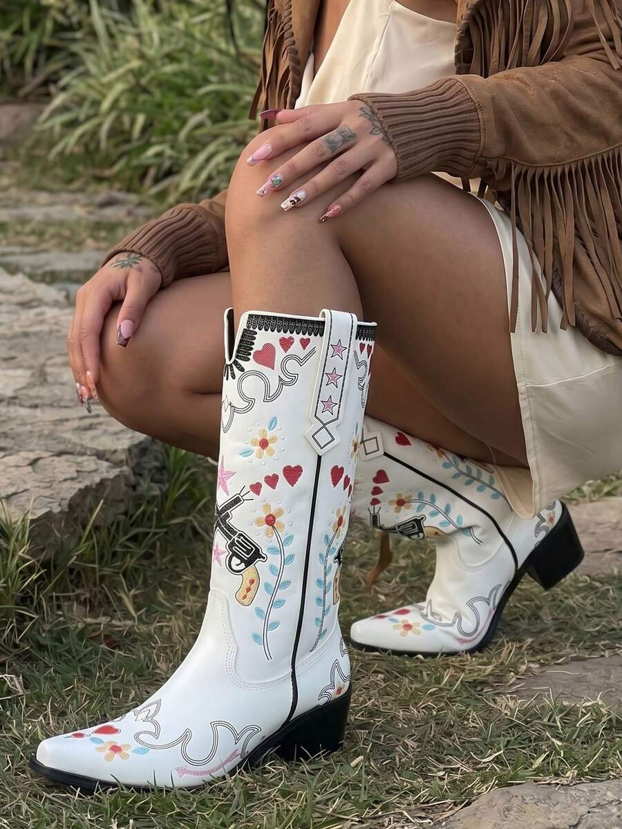Outsole view of Vintage Embroidered Women’s Western Boots - Retro Cowgirl Block Heel Mid-Calf Shoes for Stylish Weddings and Riding for punk motorcycle boot styling