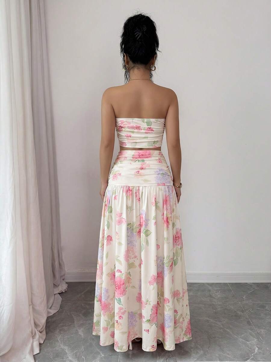 Styled view of floral strapless crop top and maxi skirt set showing visible color, print, and silhouette