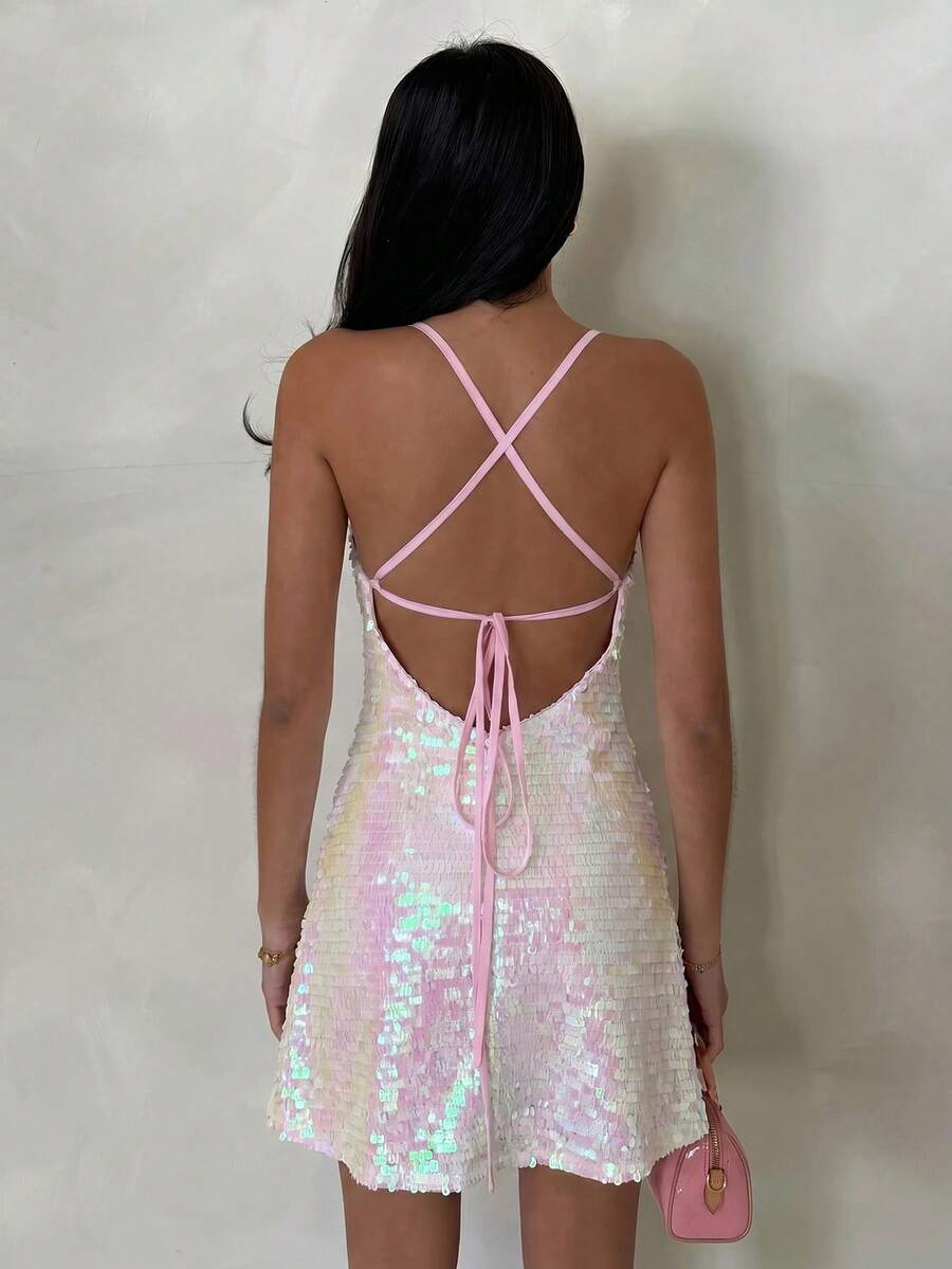 open back sequin cami mini dress with scoop neckline, spaghetti straps, crisscross tie back, fitted bodice, slight A-line mini skirt, iridescent sequin variants and orange floral print variant image 3