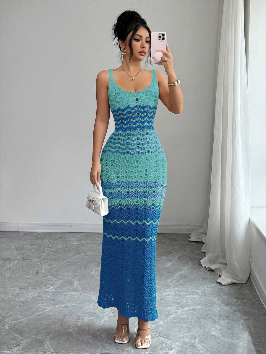 Front view of aqua teal blue crochet maxi dress with chevron openwork pattern