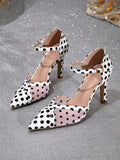 16 media show women polka dot pointed toe pumps in white/black variants with ankle bow wrap or buckle strap, stiletto or chunky block heel, sheer mesh panels on some styles. image 12