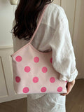 Front view of Trendy Floral One-Shoulder Canvas Handbag for Female Students - Minimalist Cloud Bubble Design in Pink color