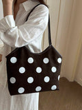 Side profile of Trendy Floral One-Shoulder Canvas Handbag for Female Students - Minimalist Cloud Bubble Design in Coffee Brown color
