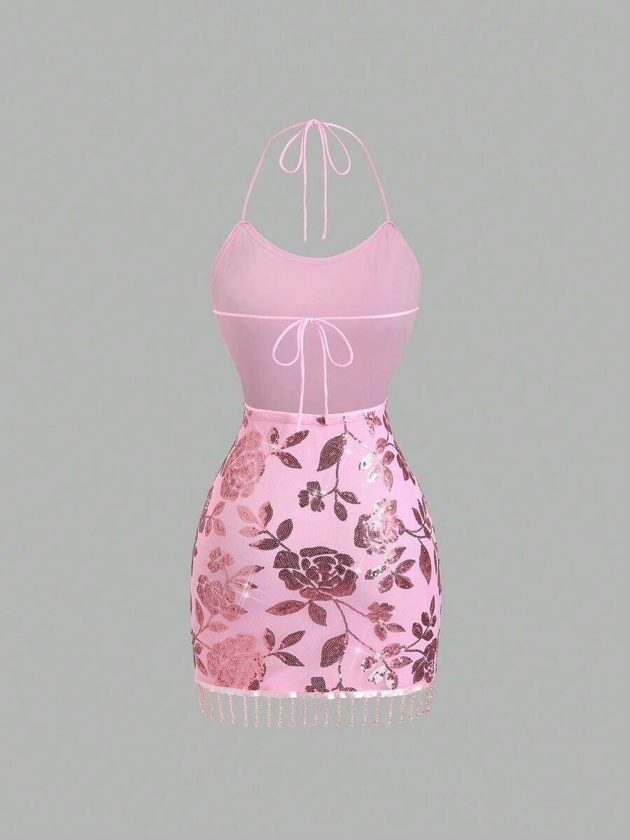 Close-up of halter neckline and sequined finish on mini dress