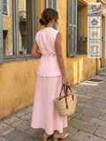 Back View of soft blush pink sleeveless vest and maxi skirt set for office and daily wear