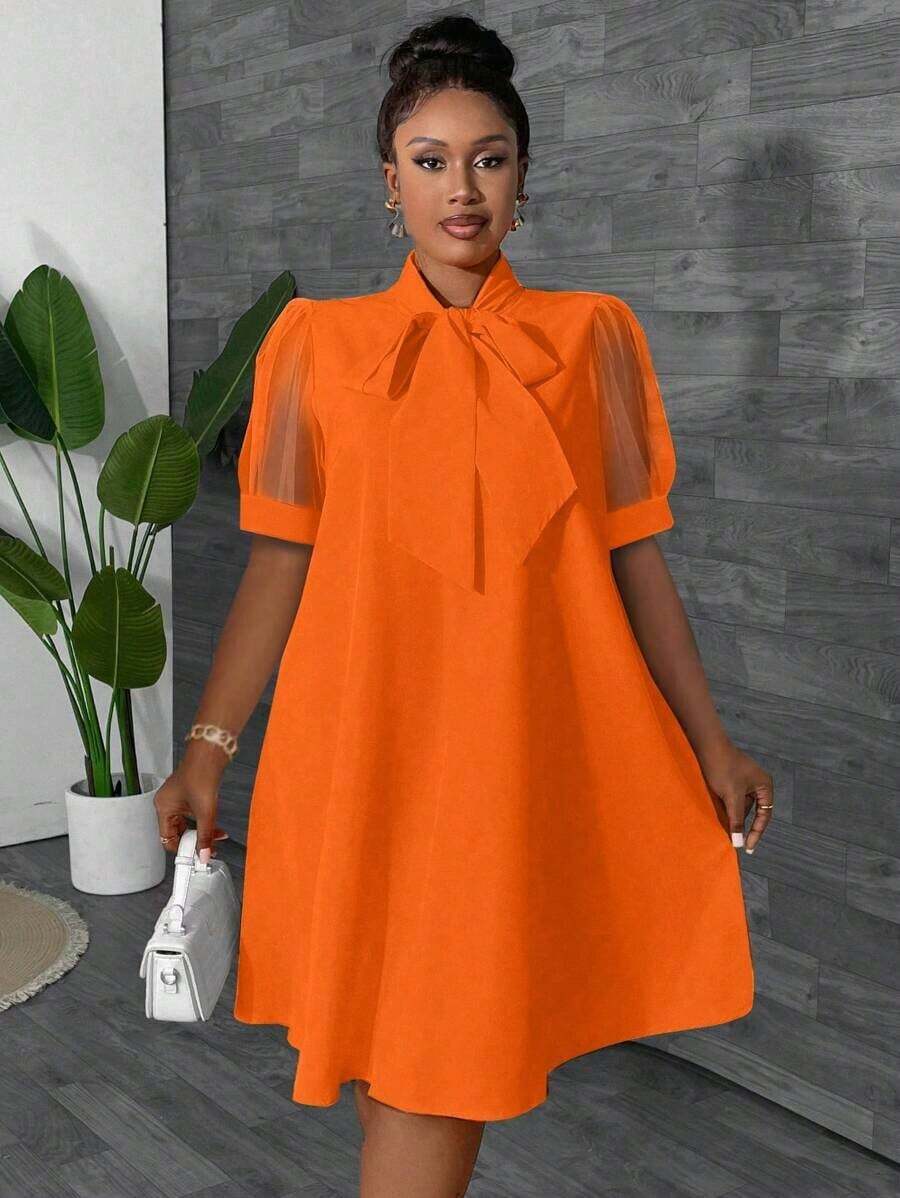 Image 2 - side profile of Stylish Plus Size Loose Mesh Patchwork Bow Design Vacation Dress for Women - Spring/Summer Orange