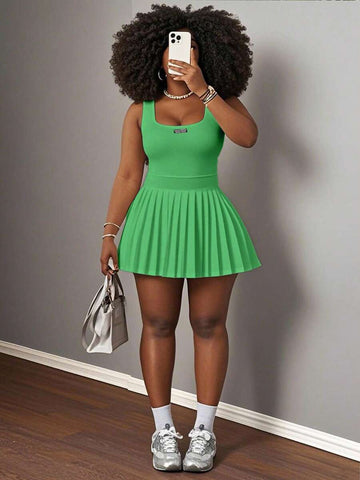 Image 1 - front view of Trendy Orange Mini Dress with U-Neck Racerback and Pleated Skirt – Perfect Spring Summer Outfit for Women