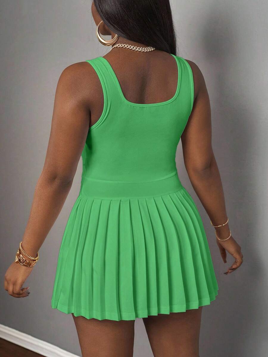 Image 1 - front view of Trendy Orange Mini Dress with U-Neck Racerback and Pleated Skirt – Perfect Spring Summer Outfit for Women