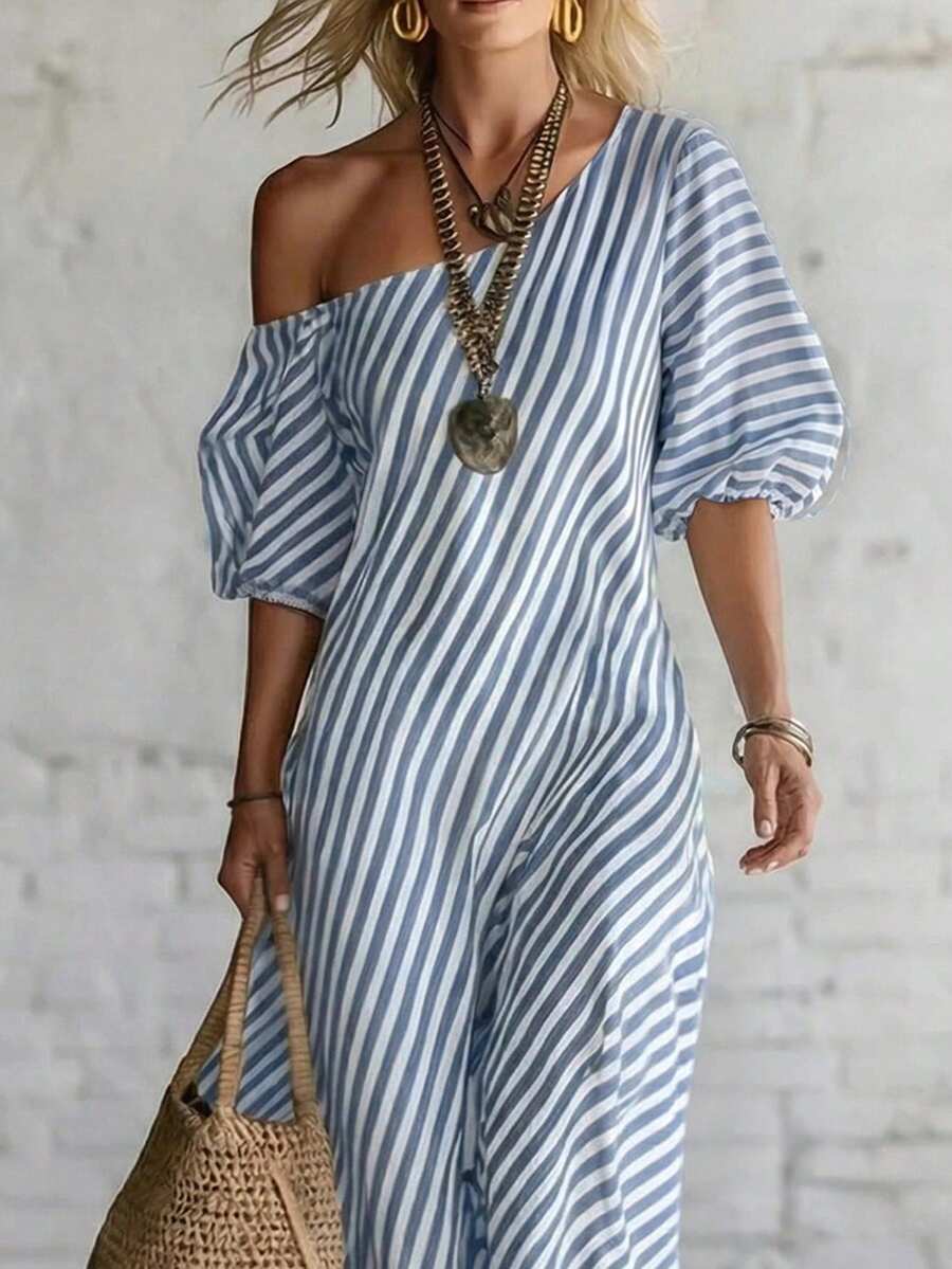 Front crop of blue striped one shoulder dress with puff sleeves and vertical stripes