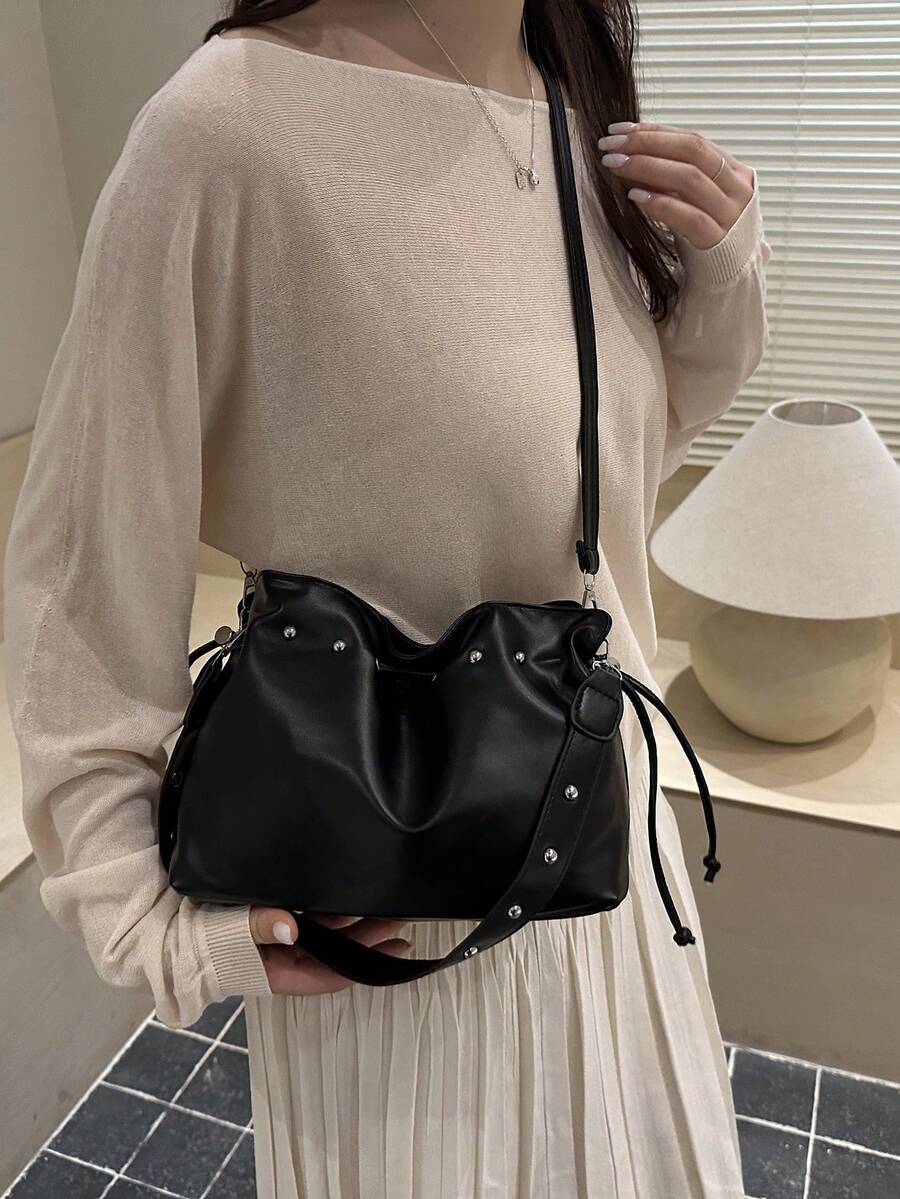 Image 2 - side profile of Trendy Minimalist Drawstring Bucket Bag - Versatile Handbag for Stylish Women