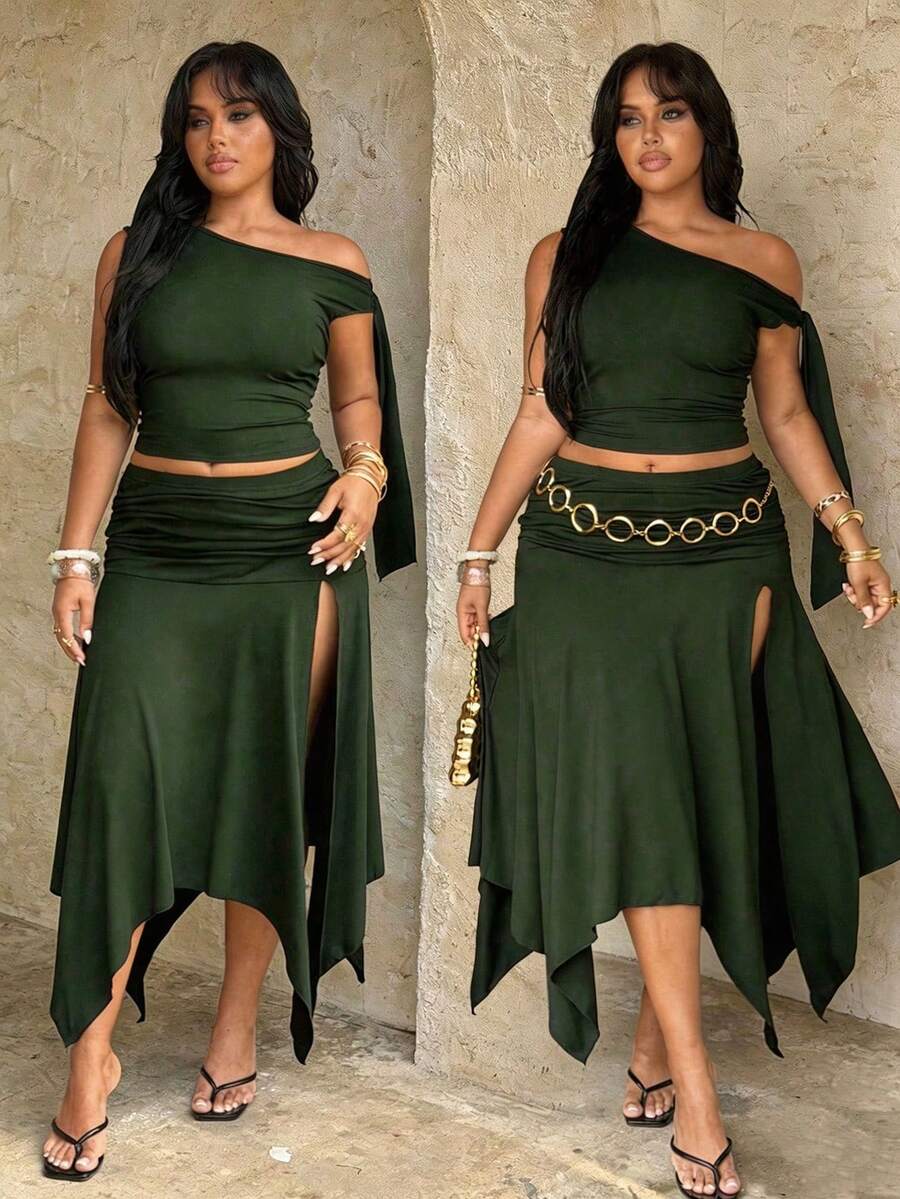 plus size two-piece skirt set in black olive green and brown with asymmetric one-shoulder crop top, draped shoulder tie panel, high waist ruched midi skirt, handkerchief hem and high thigh slit image 5