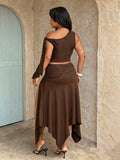 plus size two-piece skirt set in black olive green and brown with asymmetric one-shoulder crop top, draped shoulder tie panel, high waist ruched midi skirt, handkerchief hem and high thigh slit image 9