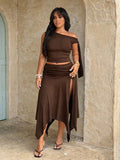 plus size two-piece skirt set in black olive green and brown with asymmetric one-shoulder crop top, draped shoulder tie panel, high waist ruched midi skirt, handkerchief hem and high thigh slit image 10