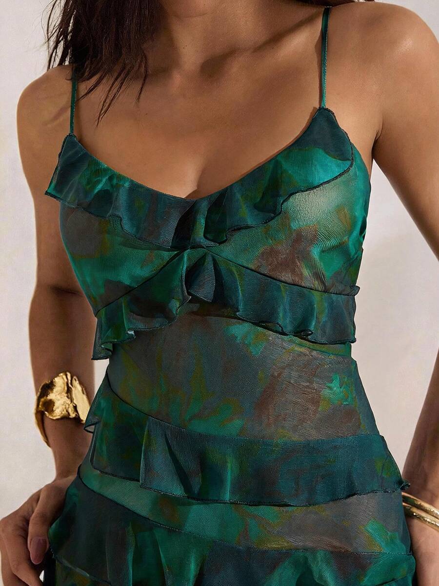 4 media show green teal abstract floral mesh maxi dress with spaghetti straps, crisscross open back, back tie, sheer overlay, ruffle trim across bust waist hips and skirt, bodycon mermaid shape. image 1