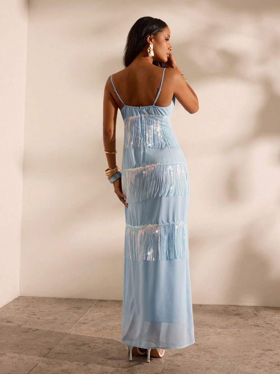 4 media show light baby blue spaghetti strap cowl neck maxi dress with sheer overlay, tiered iridescent fringe, fitted body, open back zipper, floor length, formal evening party identity. image 3