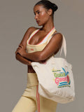 Lifestyle view of Guava Groove sport tote carried over shoulder