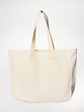 Close view of brown logo tote with boxed bottom and reinforced straps