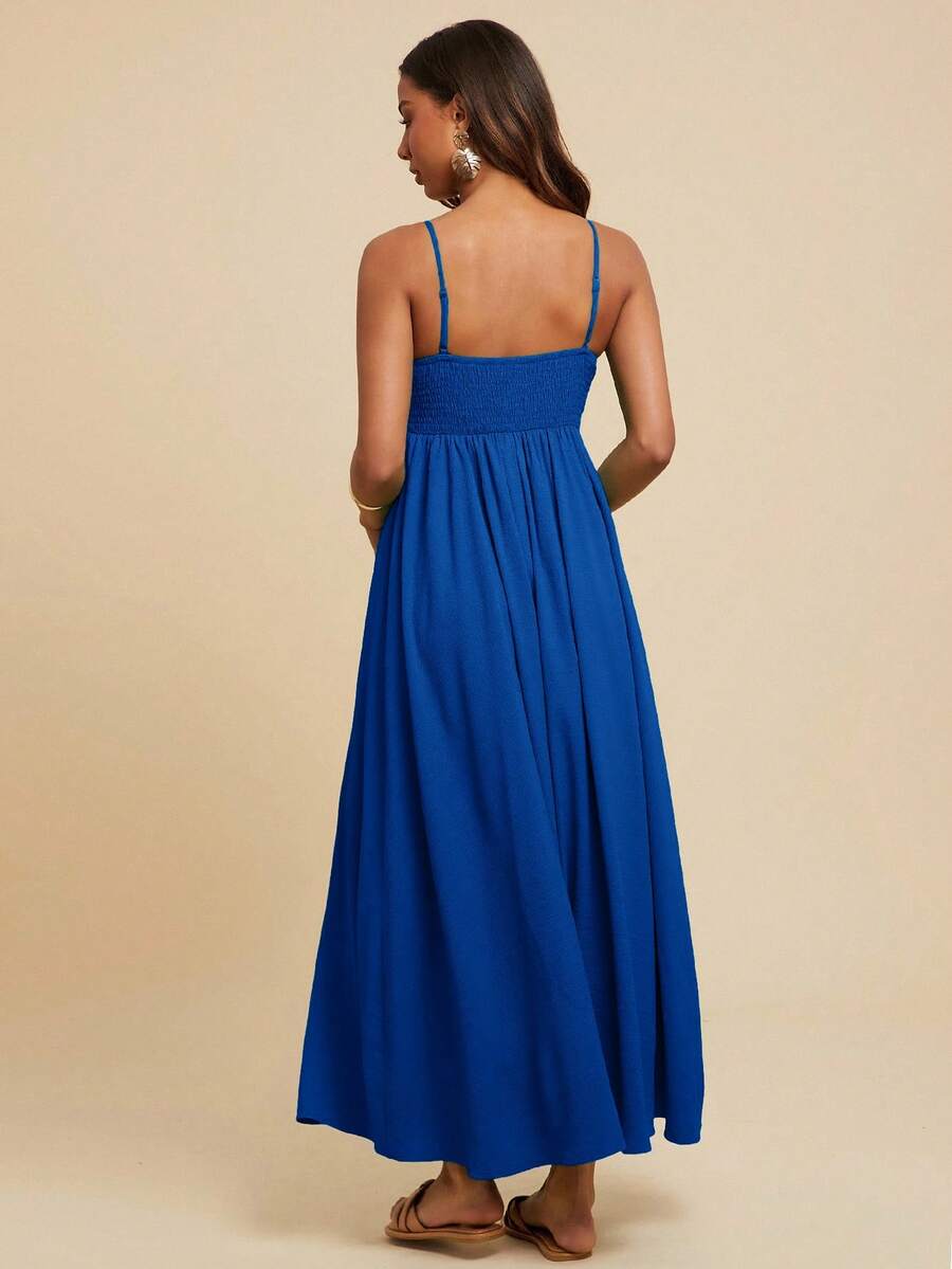 Back view royal blue maxi sundress with thin adjustable straps and smocked bodice