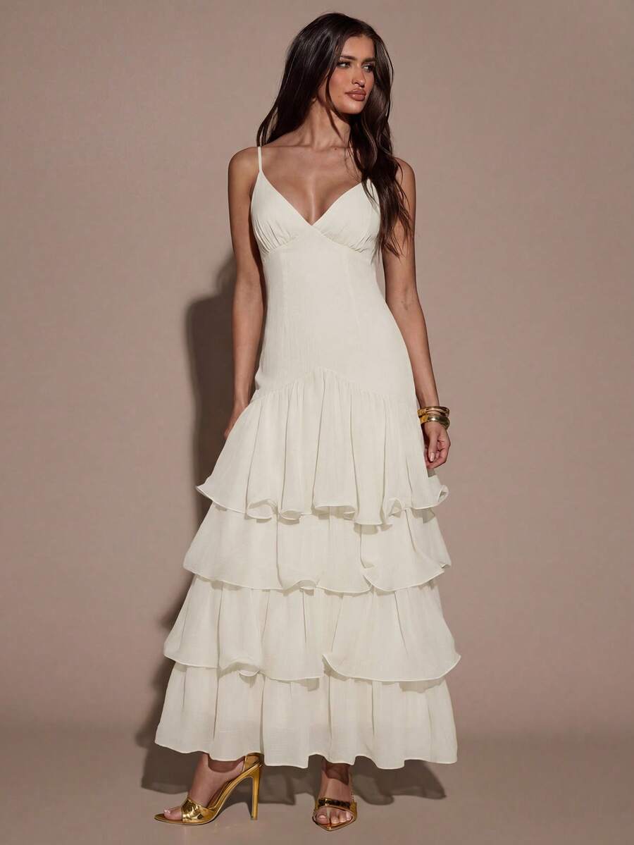 Embrace effortless summer elegance with this Elegant Layered Cream White Camisole Dress, designed for women who love a soft, feminine, and timeless style. Featuring a delicate layered design, flattering camisole silhouette, and a beautiful cream white tone, this dress creates a graceful look perfect for warm-weather occasions.