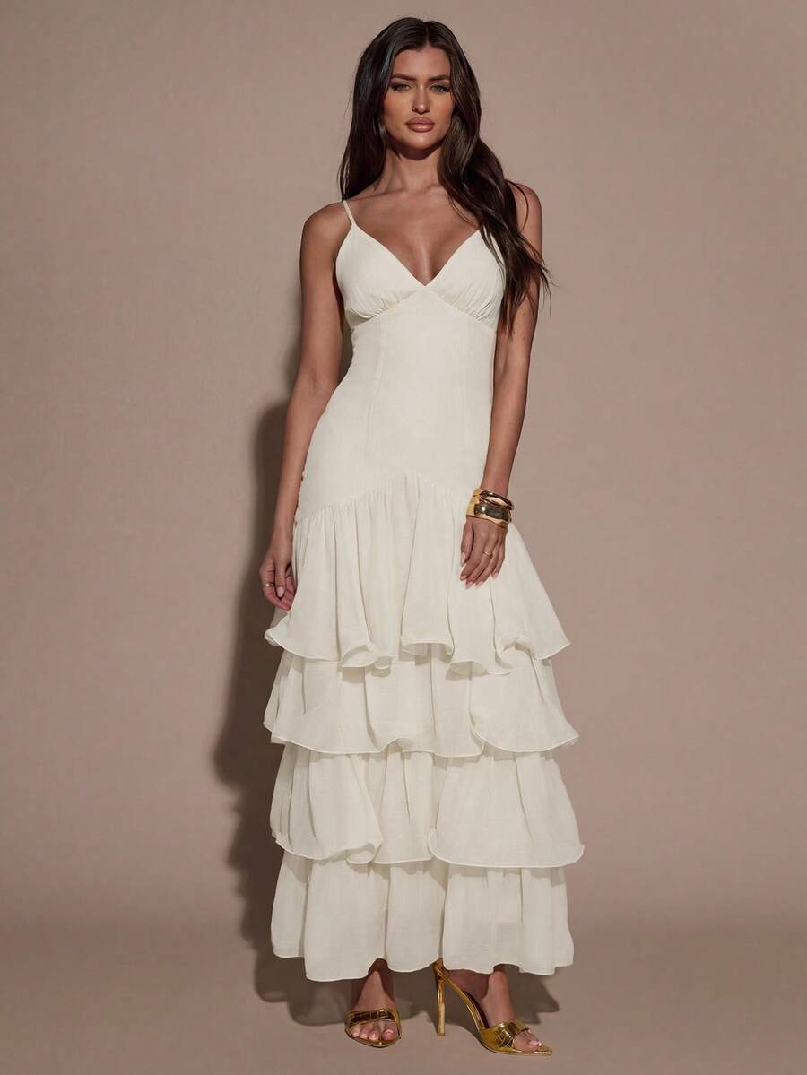Embrace effortless summer elegance with this Elegant Layered Cream White Camisole Dress, designed for women who love a soft, feminine, and timeless style. Featuring a delicate layered design, flattering camisole silhouette, and a beautiful cream white tone, this dress creates a graceful look perfect for warm-weather occasions.