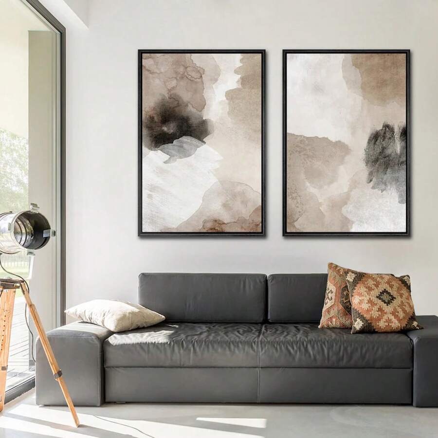 Living room view of two-piece beige and brown abstract framed wall art above gray sofa