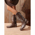 Heel view of Vintage Brown Western Cowboy Boots for Women - Floral Embroidered Mid-Calf Chunky Heels for punk motorcycle boot styling