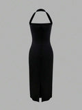 Black fitted midi dress side view
