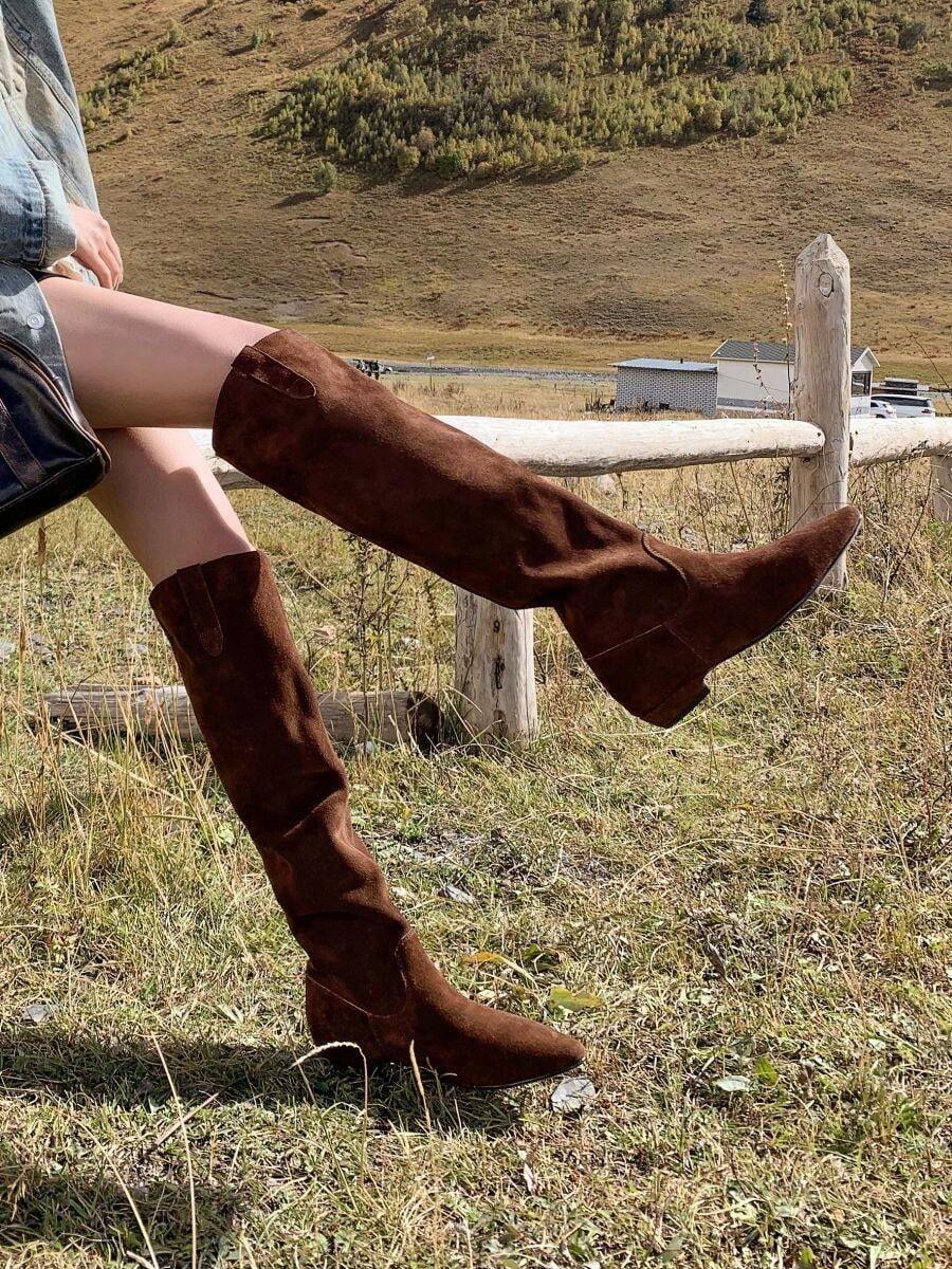 Slip-on view of Women’s Slouchy Rider Boots - Low Heel, Wide Calf, Slim Fitting Knee-High Casual Boots for Comfort and Style for punk motorcycle boot styling