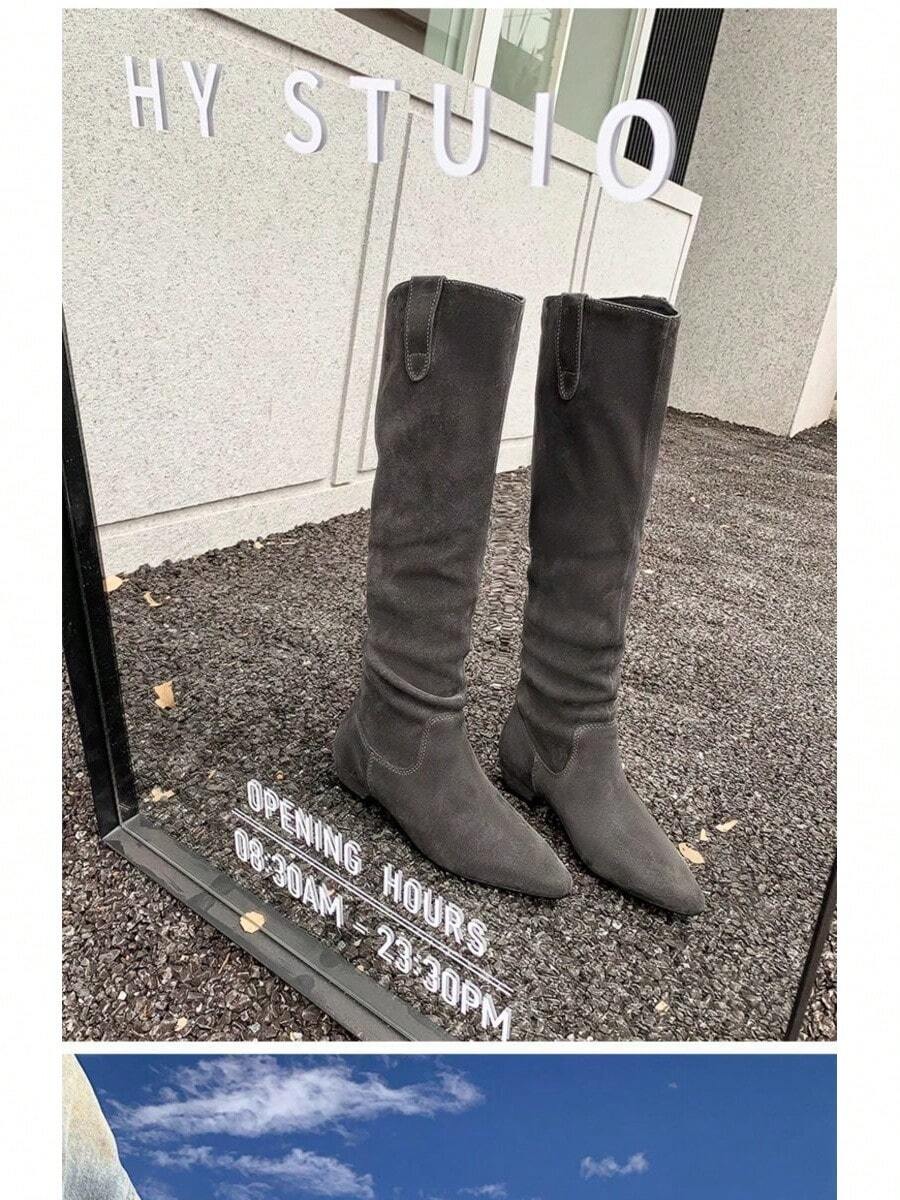 Back view of Women’s Slouchy Rider Boots - Low Heel, Wide Calf, Slim Fitting Knee-High Casual Boots for Comfort and Style for punk motorcycle boot styling