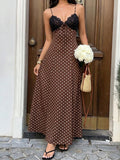 Capture effortless elegance with this blue plaid halter maxi dress, designed to blend classic charm with modern sophistication.