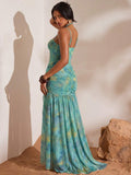 Back view of tie-dye halter maxi dress with low open back and gathered skirt