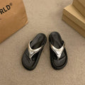 6 media show thong flip-flop slide sandals in cream strap on black sole, all black, and metallic silver strap on black sole with V-shaped toe post strap, broad padded upper, thick black contoured footbed/outsole, small gold metal logo plaque. image 6