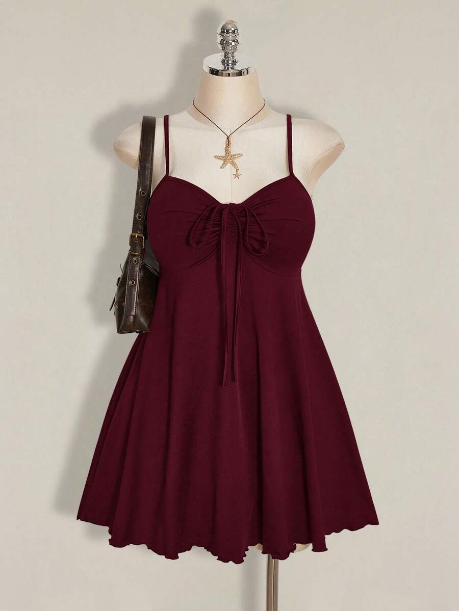 Front view of Chic Plus Size Solid Color Ruched Cami Dress with Front Tie for Women