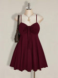 Side profile of Chic Plus Size Solid Color Ruched Cami Dress with Front Tie for Women