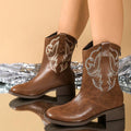 Heel view of Chic Embroidered Cowboy Boots for Women - Versatile Mid-Calf Style with Chunky Heels for punk motorcycle boot styling