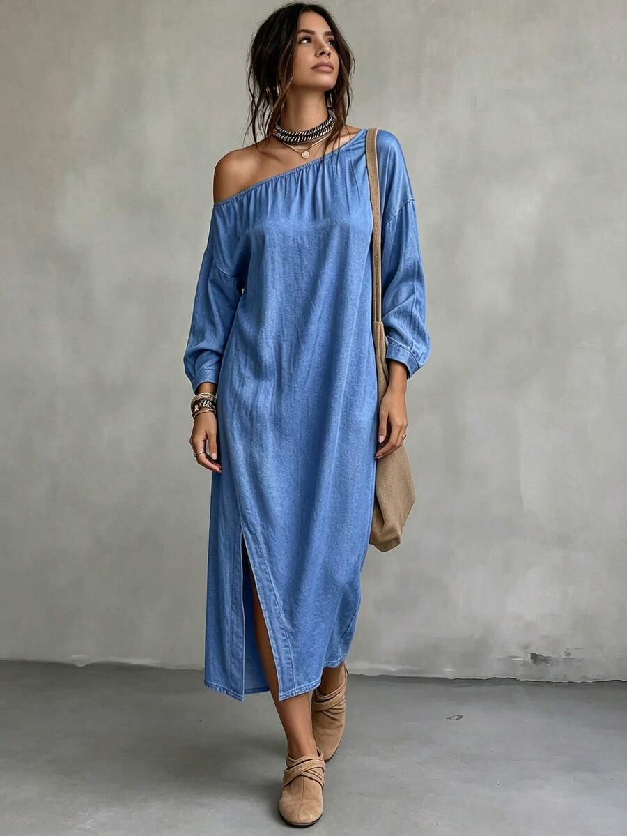 Full front view of asymmetrical off shoulder blue denim dress with relaxed fit