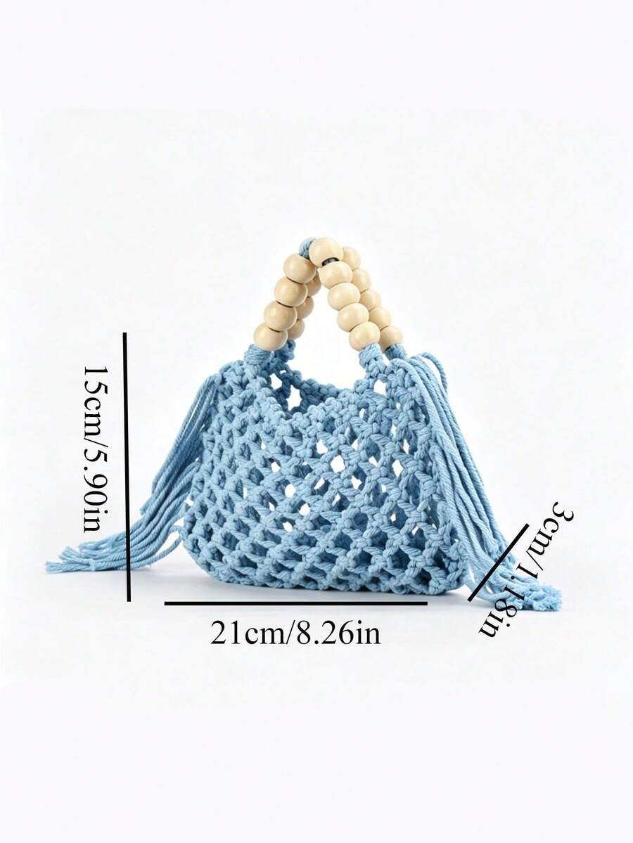 Light blue crochet mesh beach handbag with beige wooden bead handles open top and long tassel fringe on both sides