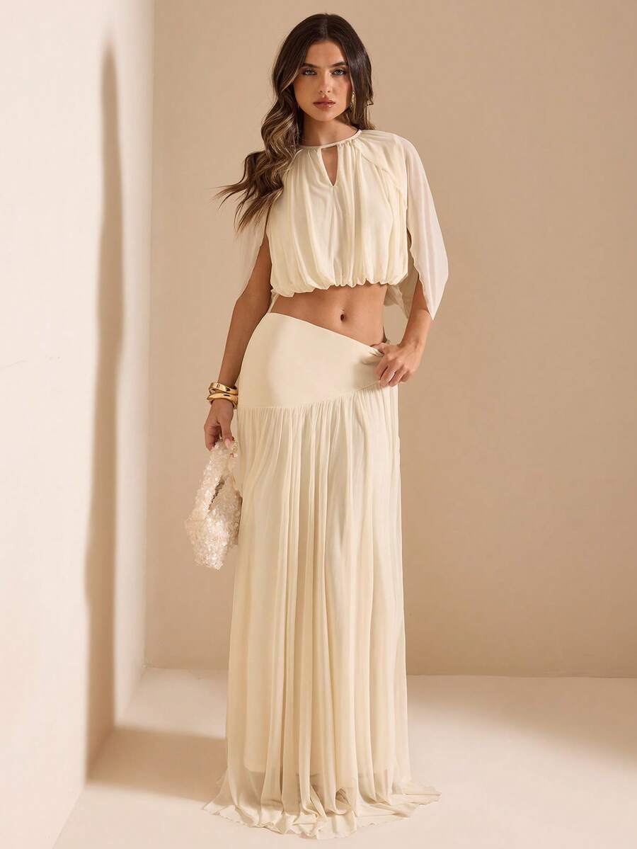 Back view of Chic Apricot Two-Piece Set: Elegant Top and Skirt for Fashionable Women for women styling