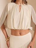 Detail view of Chic Apricot Two-Piece Set: Elegant Top and Skirt for Fashionable Women for women styling